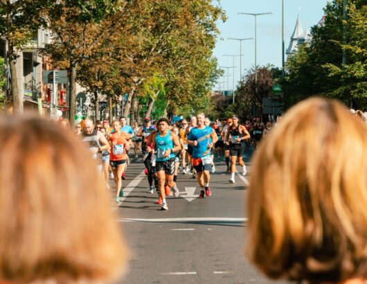 The image of people in the city running competition